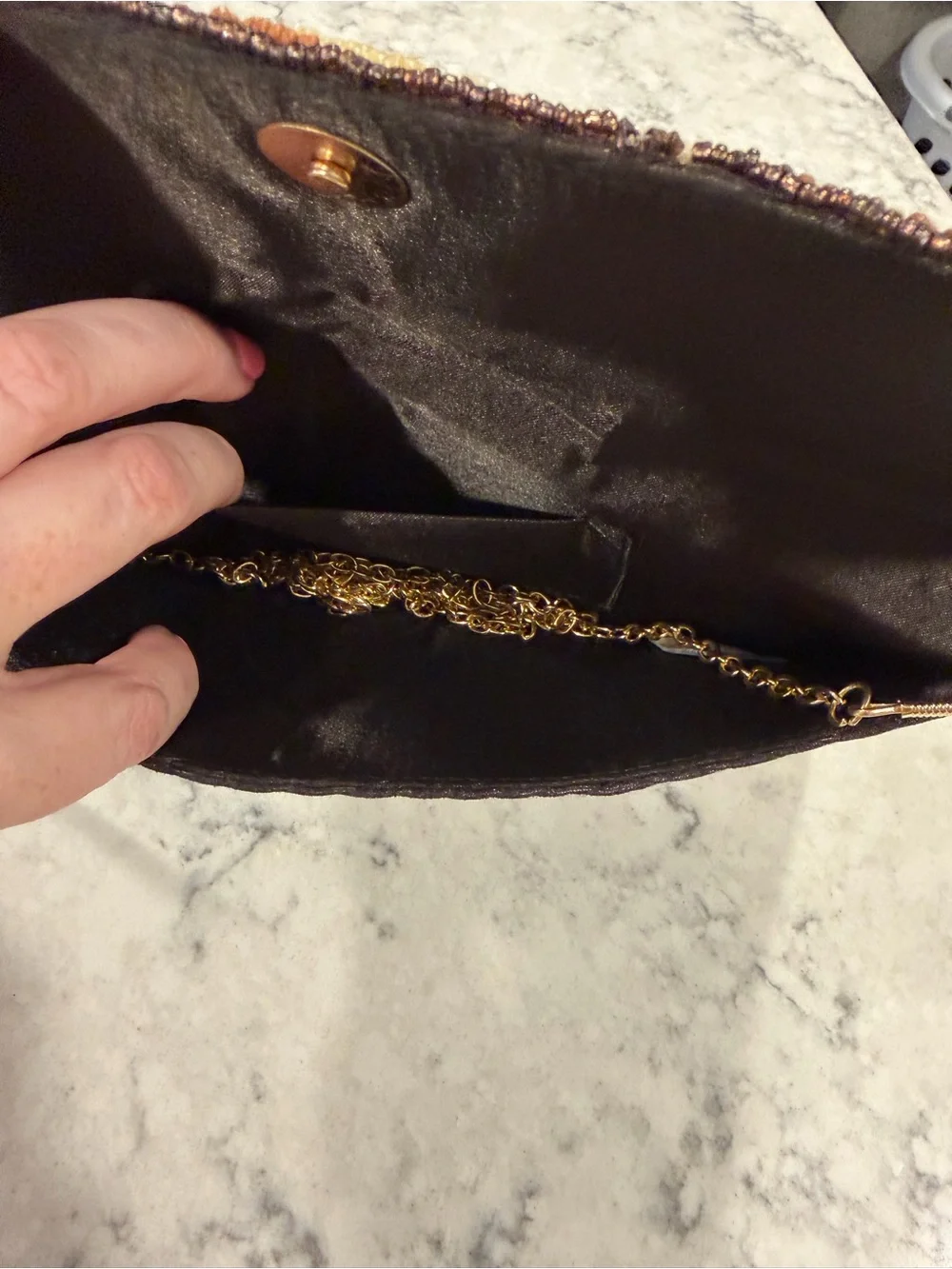 Beaded Clutch espresso martini clutch in Brown & Black with gold crossover chain